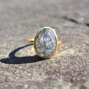 granite backdrop, natural sunlight, natural stone