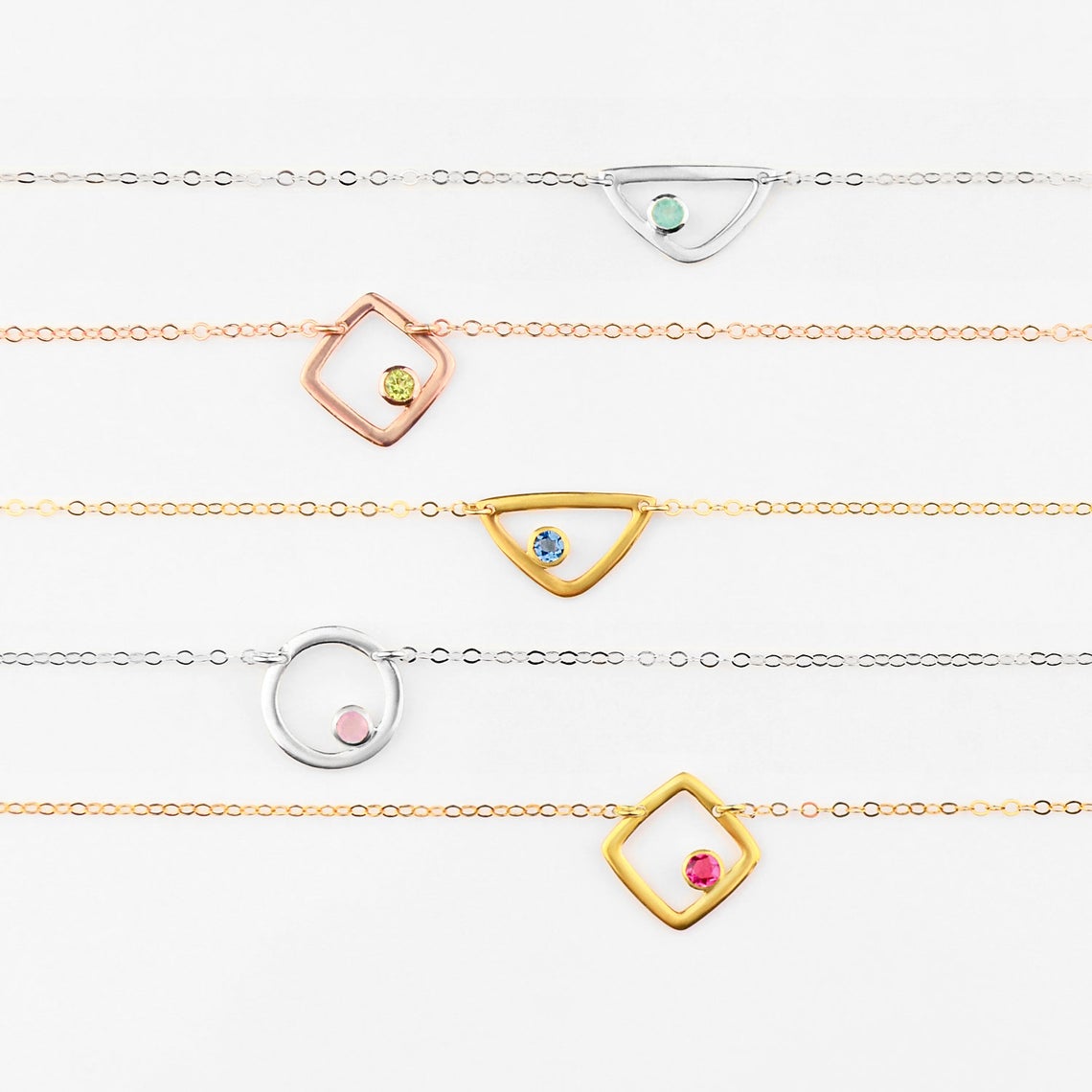 Shop the entire eden collection our open geometric shapes include triangle, square/diamond or circle all available in silver, gold or rose gold. 