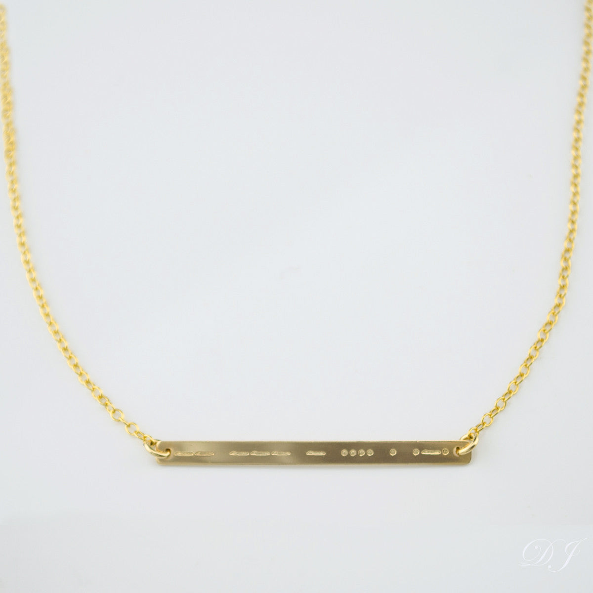 https://www.daniquejewelry.com/cdn/shop/products/skinny-monogram-bar-necklace-1285_1200x.jpg?v=1616531576