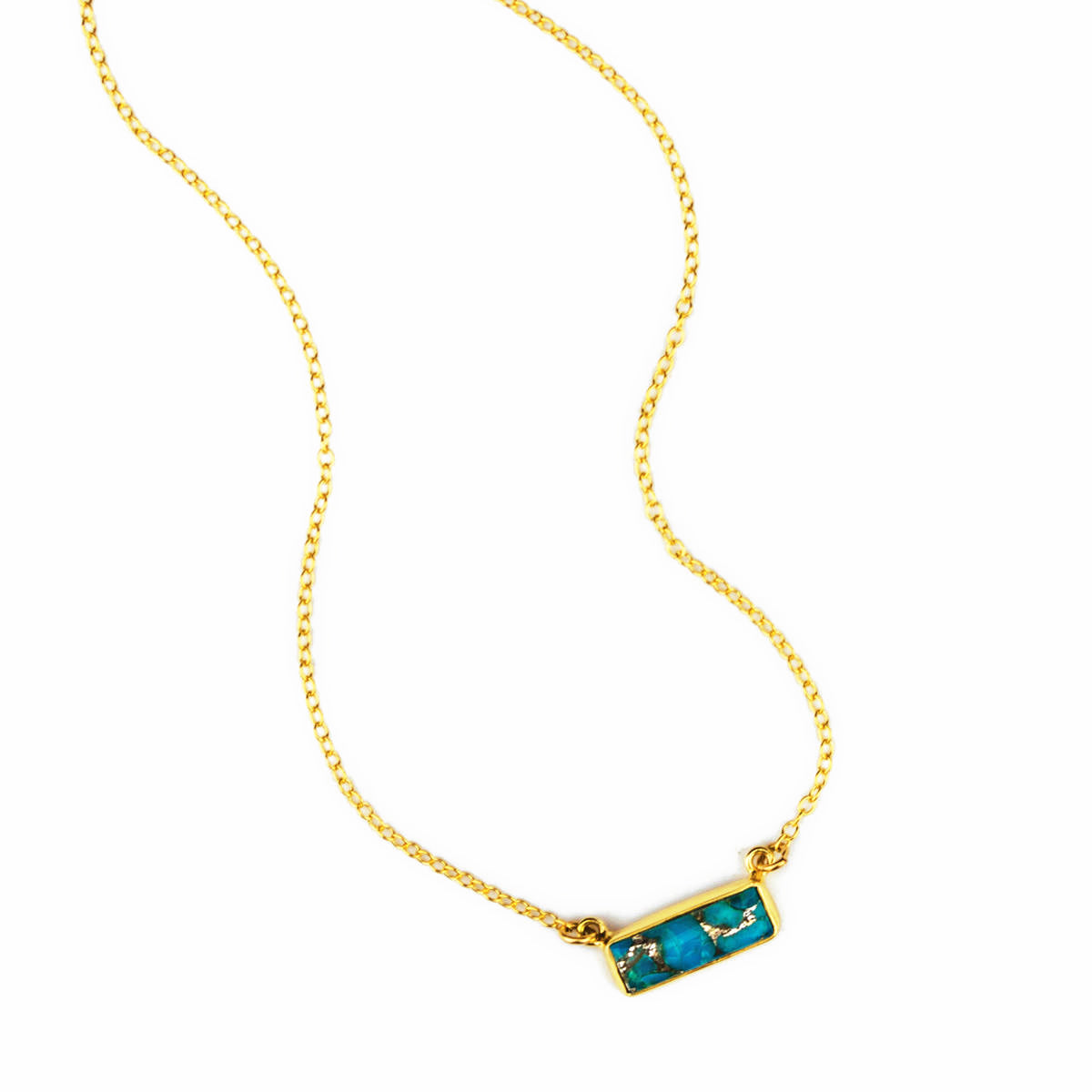 Single gold filled cable chain copper turquoise horizontal adira bar necklace with white background. december birthstone