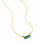 Single gold filled cable chain copper turquoise horizontal adira bar necklace with white background. december birthstone