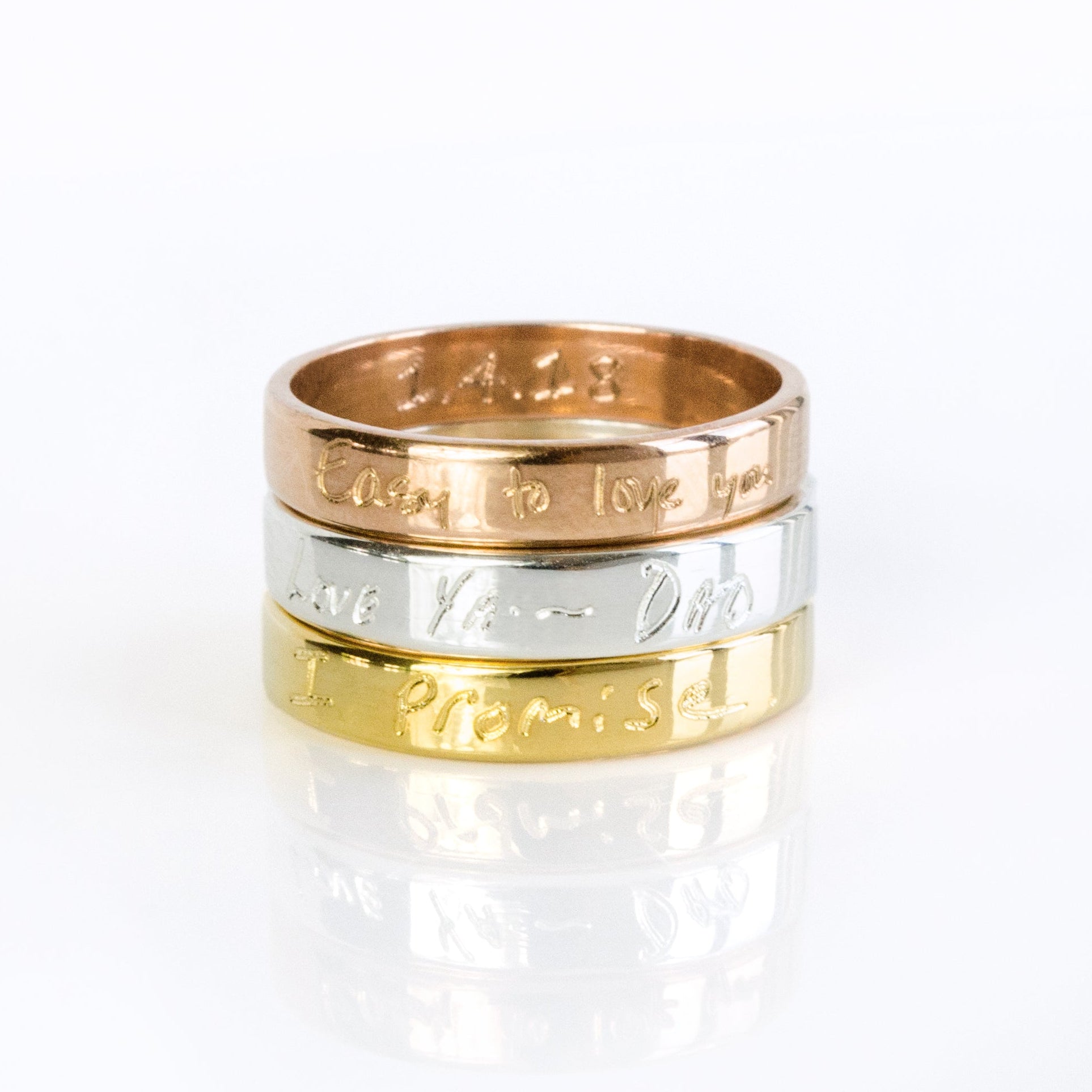 Three Ring Bands in Vermeil Rose Gold, Sterling Silver, and Vermeil Gold each personalized with engravings of actual handwriting text. Ring Bands can be engraved on both the outside and inside. Love Note Actual Handwriting Engraved Ring, Anniversary Gift for Him, Personalized Rings for Couples, Gift for her, gift for him, memorial gift, commemorative gift, gift for fiance, gift for husband, gift for wife, gift for girlfriend, gift for boyfriend, silver anniversary gift, wedding gift, graduation gift