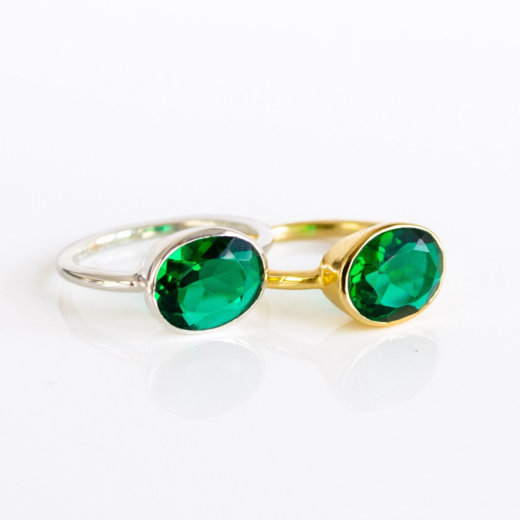 green emerald quartz ring, may birthstone gift, emerald ring for women, Pair of stackable emerald rings—gold vermeil and silver—showing how the bezel-set oval gemstone layers with other bands. Versatile green stone ring for creating a personalized stack, from dainty minimal to bold cocktail looks. Perfect anniversary gift or birthday jewelry for May.