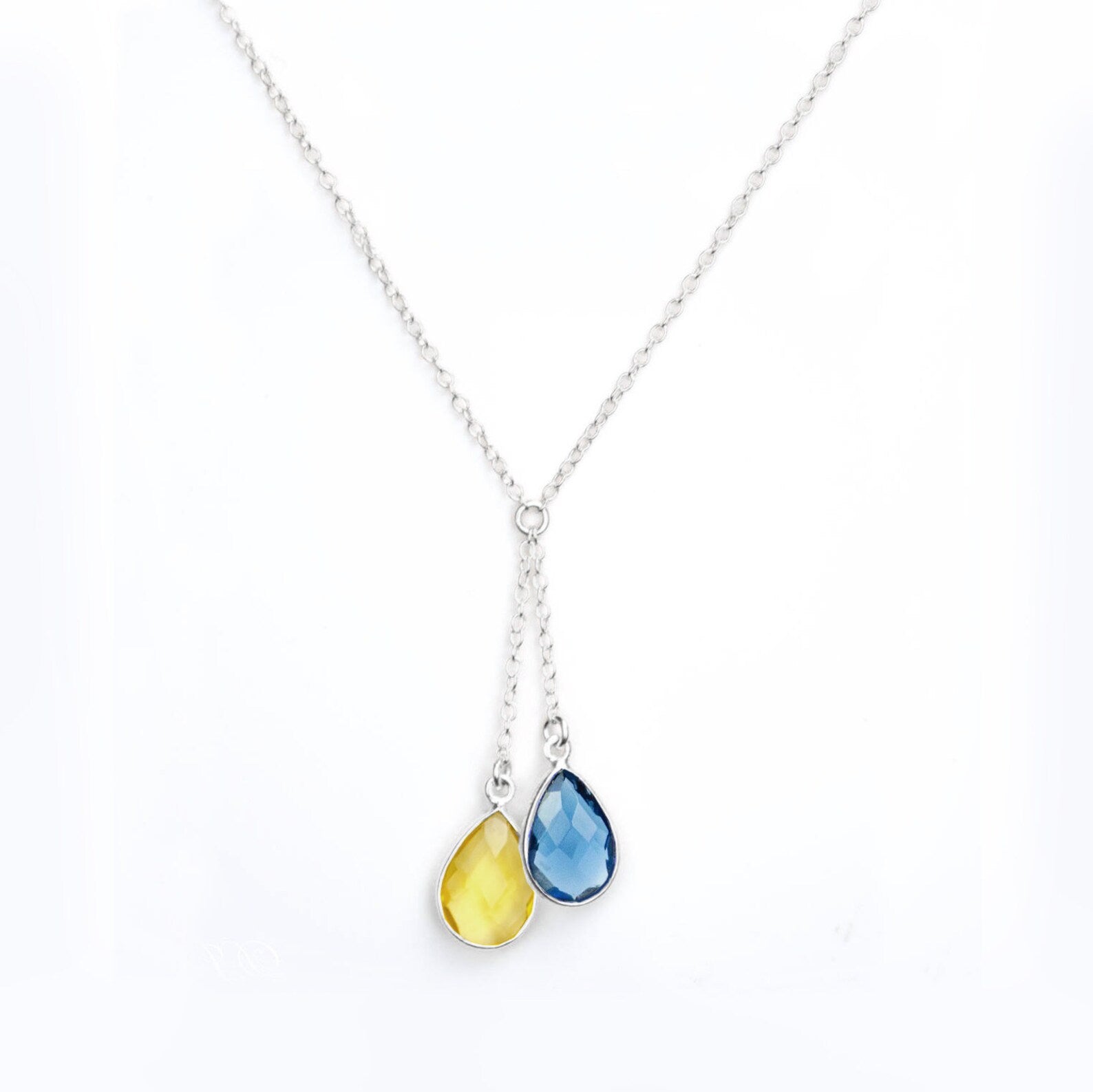 sterlingsilverlariatnecklacelariatstylegemstonenecklaceukraineflagukrainingflagcolorbirthstoneslariantsupportforukrainenecklacepeaceforukrainefundraiserjewelry.jpg