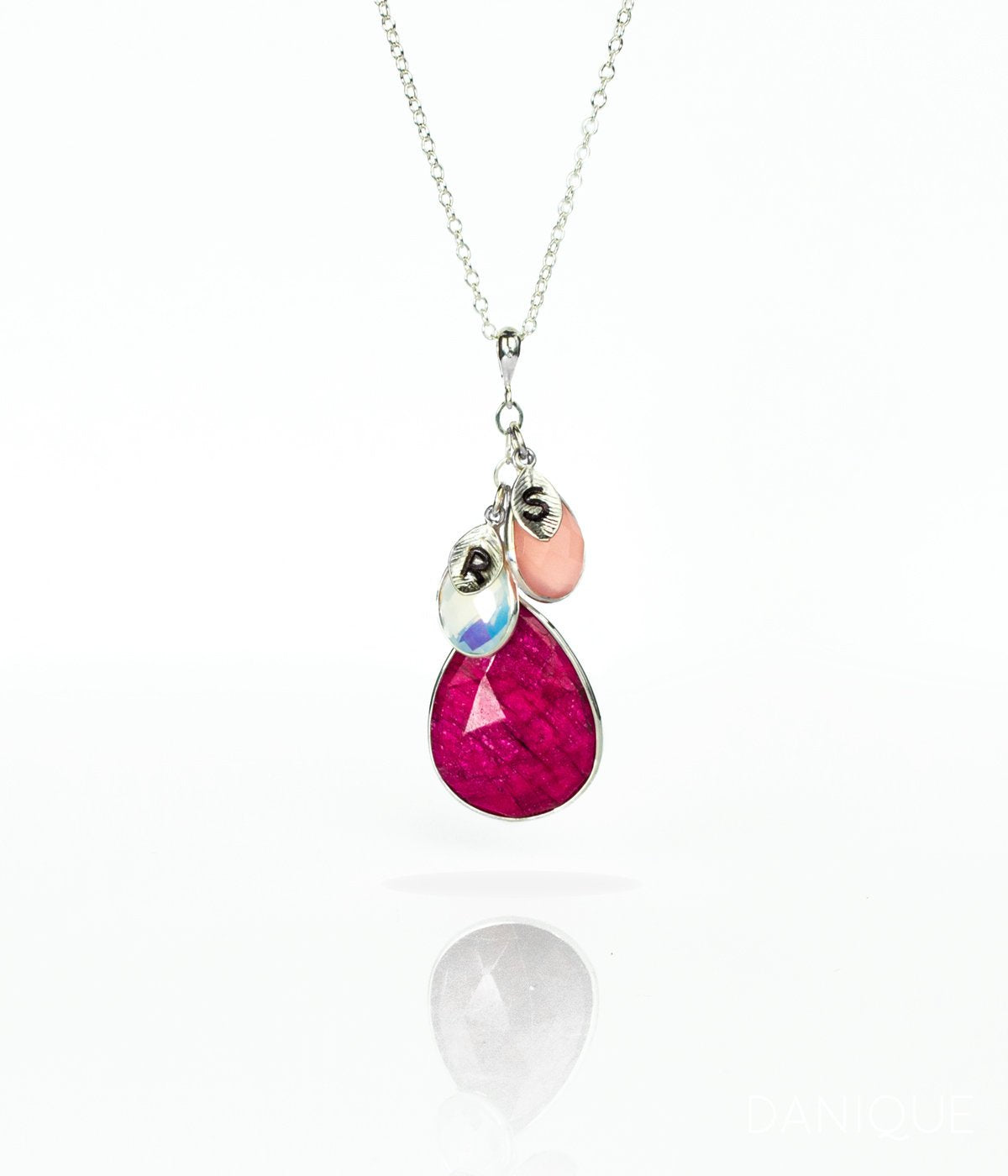 Single sterling silver cable mothers birthstone necklace with large ruby birthstone and opalite and pink chalcedony kids birthstones with hand stamped leaf charms