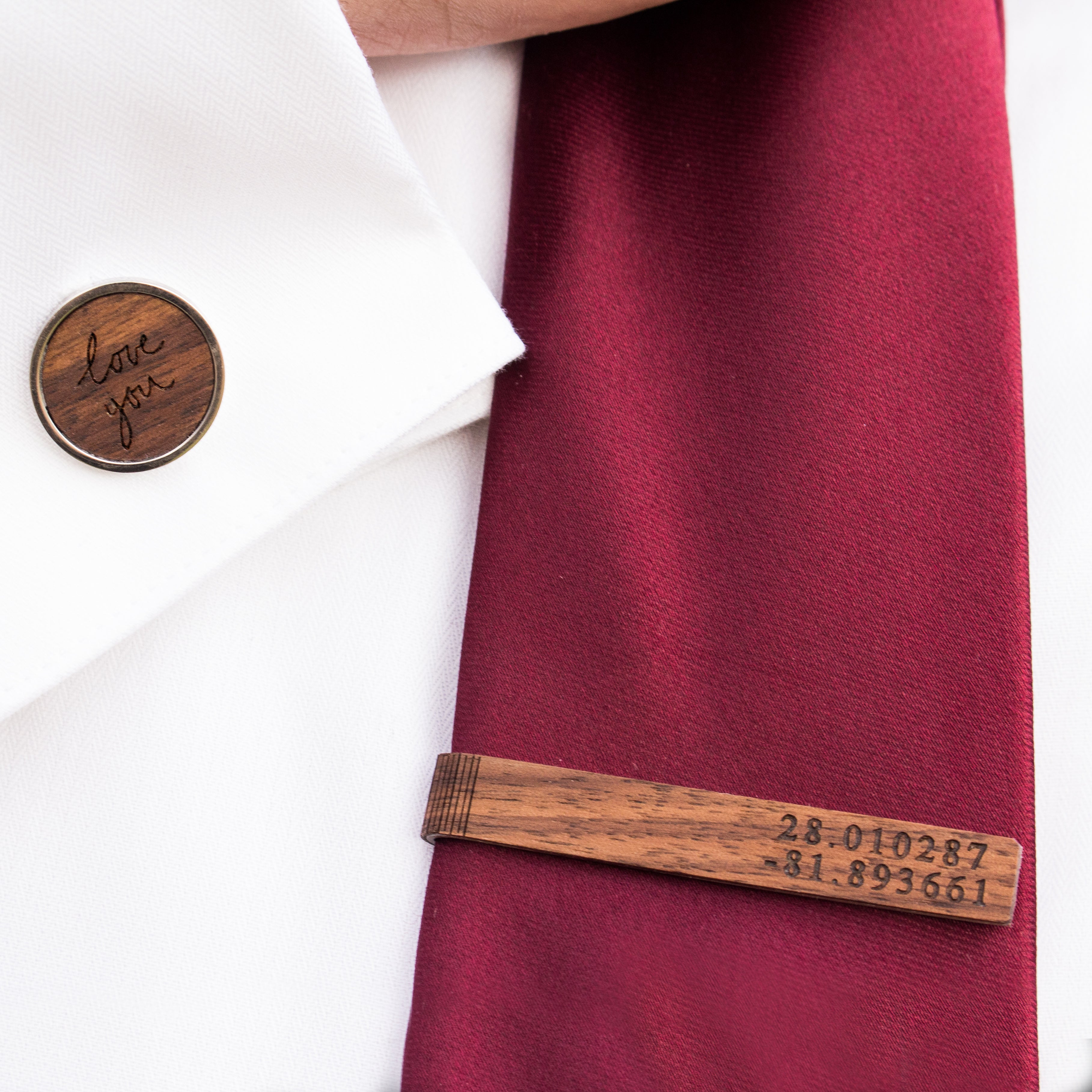 man wearing matching wood cufflink and tie clip with coordinates and handwriting from photo engraved. Customize cufflinks for a graduate, new promotion, prom, formal events, groomsman or wedding party gifts. gift ready. mens anniversary gifts, gifts for men, christmas gifts for him, valentine's day gifts for men, gift for husband, gift for fiance, father's day gift, birthday gift, wedding anniversary gift, wedding party gift, father of the groom gift, father of the bride gift, wood anniversary