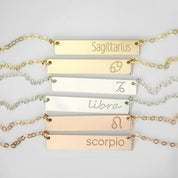 6 zodiac signs in different styles sit on a gray background. Custom name engraved bar necklace Personalized bar pendant for women Minimalist engraved bar charm necklace Custom message bar necklace Engraved bar necklace for her Personalized engraved coordinates pendant Minimalist bar necklace with custom engraving Custom bar necklace for weddings Engraved minimalist necklace for men